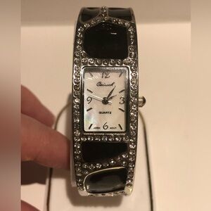 3/$40 Osirock Black and Silver Quartz Bangle Watch